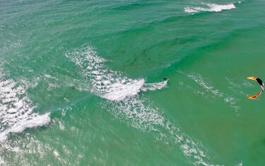 Riding the waves in Pays Bigouden © Air Pixel Concept